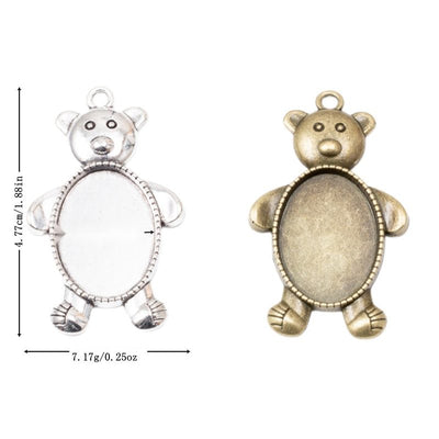 Group view of teddy bear with an oval recessed cabochon tray