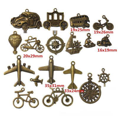 Group view of an assorted mix includes cars, bicycles, aircraft, boats, and nautical motifs