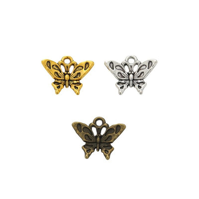 Grouped front view of butterfly charm showing openwork wings and a small top loop