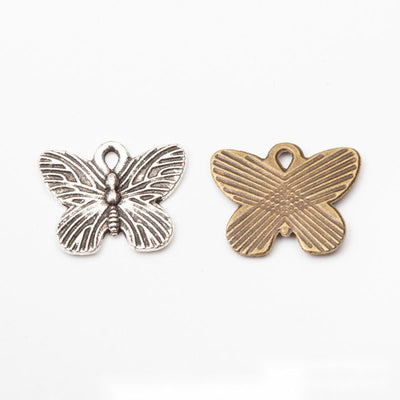 Striped Butterfly metal pieces shown in the available finishes.