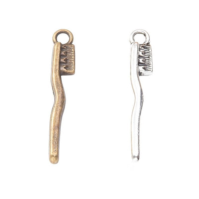 Mini Toothbrush metal piece shown in Antique Bronze, Antique Silver