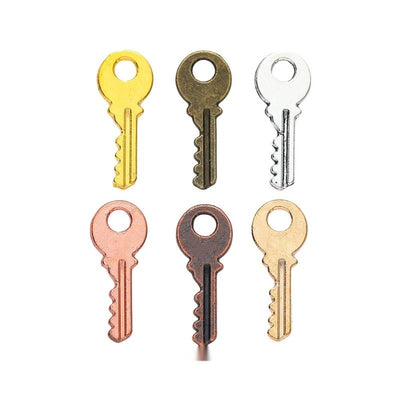 Mini Key metal piece shown in Antique Bronze, Gold, Antique Copper, KC Gold, Rose Gold, Antique Silver