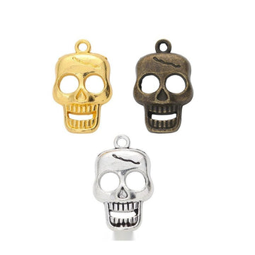 Smiling Skull Metal Charm in Gold Bronze and Antique Silver