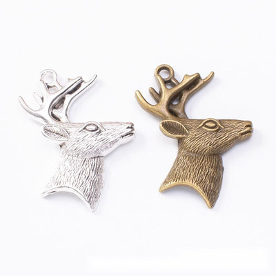 Grouped front view of the antlered deer head metal charm pendant in all pictured styles