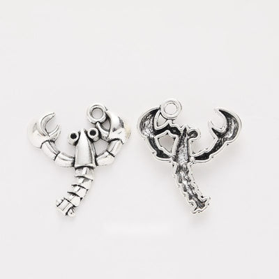 Detailed Lobster Charm shown in all pictured finishes on a white background