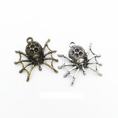 Spider Setting Charm Pendant finish comparison showing a spider body with recessed round settings