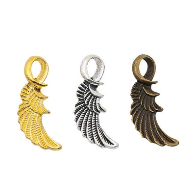 Front view of curved feather wing charm showing finish variation 1