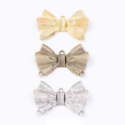 Textured Bow Metal Connector Charms grouped product view on a white background