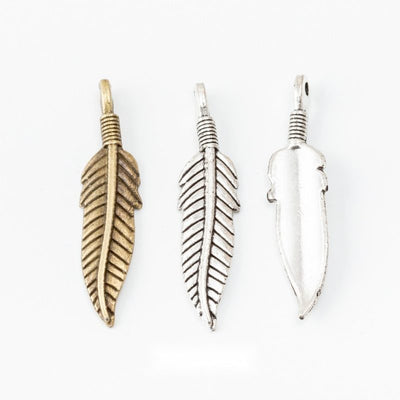 Front comparison of detailed feather metal component in 2 finishes