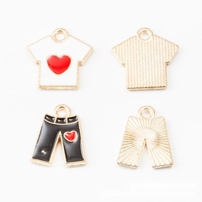 Group view of white shirt and black shorts designs feature glossy red heart accents