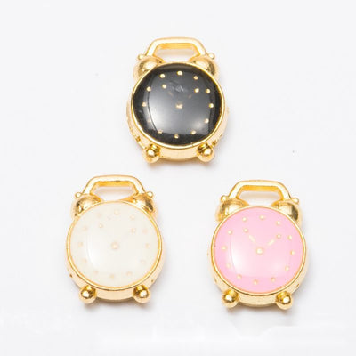 Small alarm clock with a colored face shown across the available colors