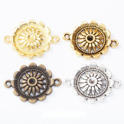 Bright Gold, Antique Bronze, Antique Silver, Light Gold sunflower connector shown in an overview