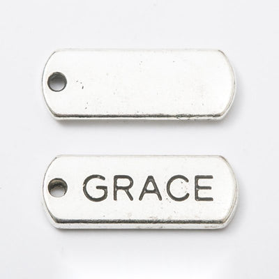 grace rectangular message tag charm shown from the front in the available metallic finishes
