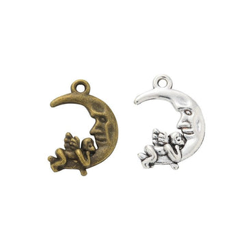 Crescent Moon and Cherub Metal Charm in Two Antique Finishes
