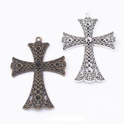 Flared Filigree Cross components shown together in the available finishes