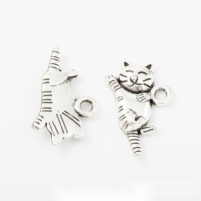 Playful Cat metal component, front grouping showing the available finishes.