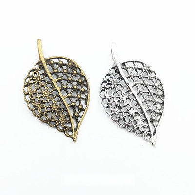 Front and finish comparison of openwork leaf charm