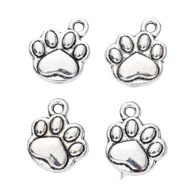 Paw print charm shown in grouped front views