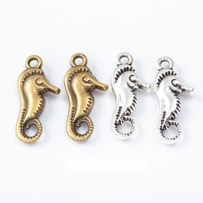 Front and finish comparison of seahorse charm