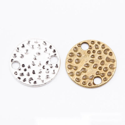 Hammered Round Two-Hole Metal Connector Disc shown in the available visible finishes