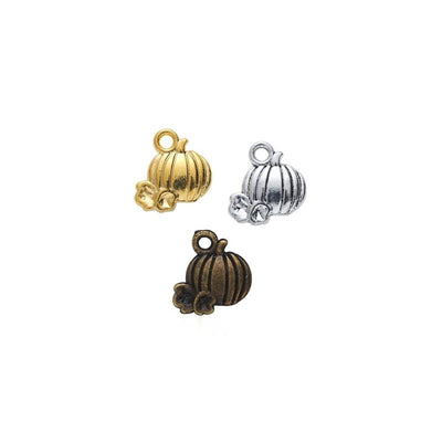 Grouped front views of the ribbed pumpkin and vine charm in three metallic finishes