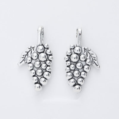 Large Grape Cluster Charm shown in the available metal finishes on white