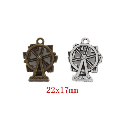 Assorted ferris wheel charms arranged together on a white background