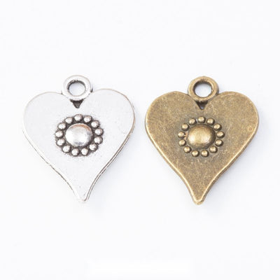 Floral Heart Charm Pendant finish comparison showing a heart silhouette with a beaded flower center