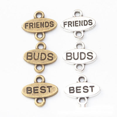 Friendship word connector metal component, grouped front view on white