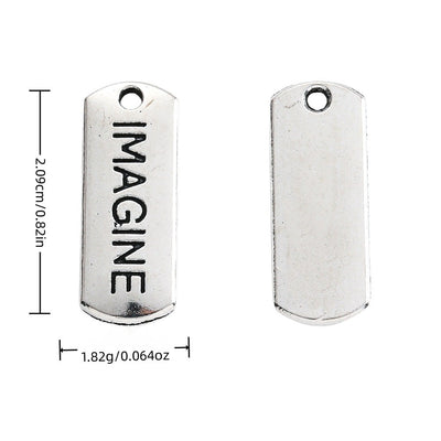IMAGINE Engraved Rectangular Tag Pendant Charm in Antique shown in front and back product view