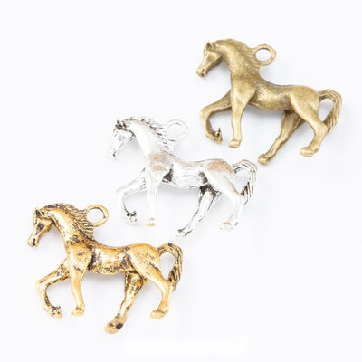 Walking Horse Charm grouped finish options on a white background