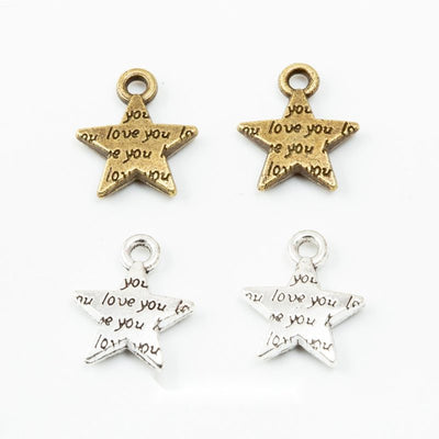 I Love You Star Metal Charms in Two Finishes in multiple metallic finishes displayed together on a white background.