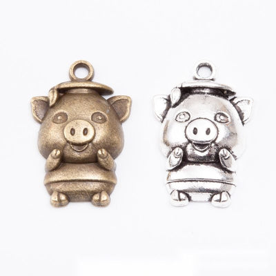 Front-facing pig with a rounded body and raised snout shown in the available finishes