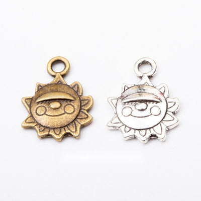 Smiling Sun Face Metal Charm Pendant shown in the available visible finishes