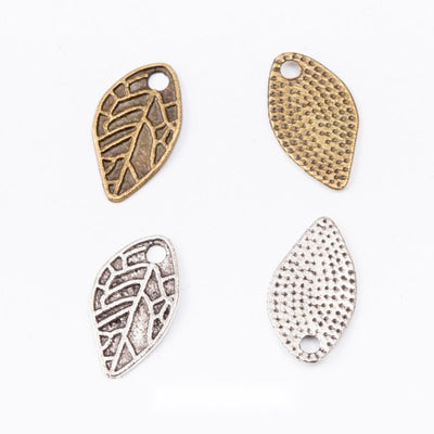 Openwork Leaf Charm Pendant finish comparison showing leaf veins on the front and a dotted reverse texture