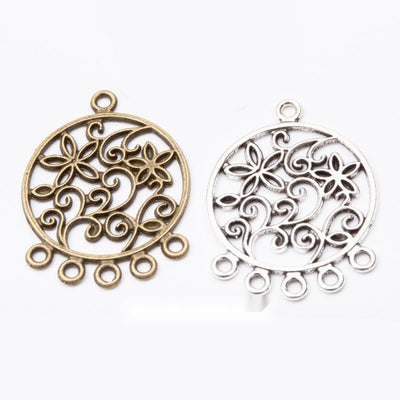 Grouped front view of floral five loop connector charms in the available finishes