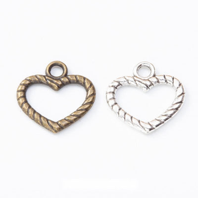 Rope edge heart charm shown across the available finishes