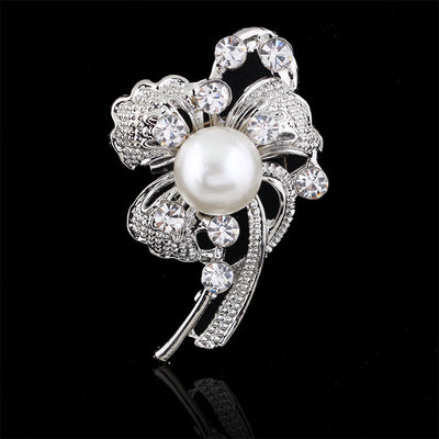 Front product view of the flower brooch pin in black and silver