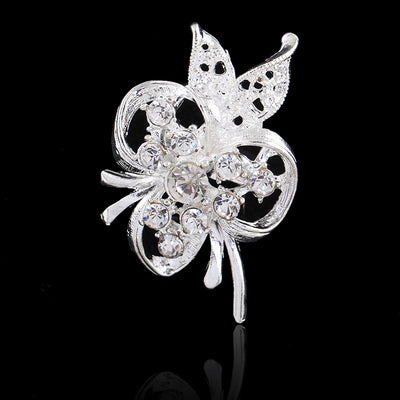 Front product view of the butterfly brooch pin in black and silver