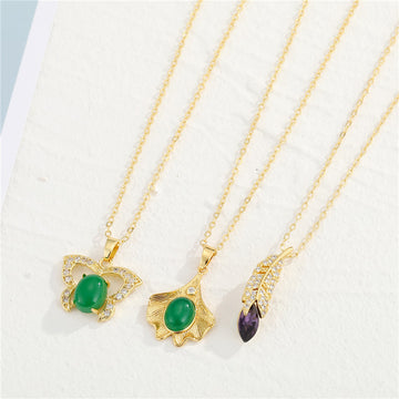 Gold Tone Butterfly, Ginkgo Leaf and Feather Pendant Necklaces