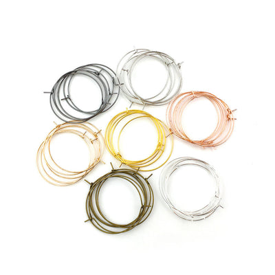 Yellow assorted shape charms arranged on a light background