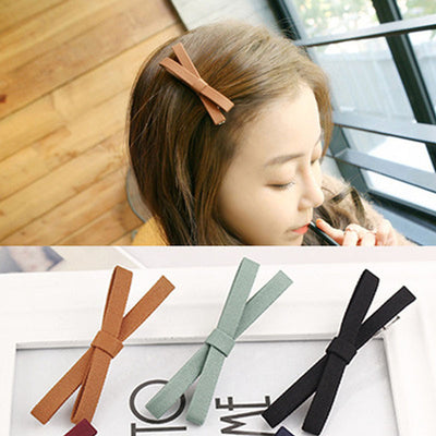Primary supplied view of brown fabric bow hair clip