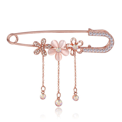 Front product view of the ribbon bow brooch pin in red and orange