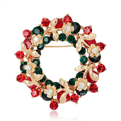 Front product view of the floral wreath brooch pin in gold and red