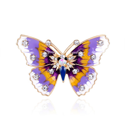 Front product view of the butterfly brooch pin in purple and gold