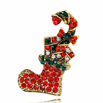Front product view of the flower brooch pin in gold and red