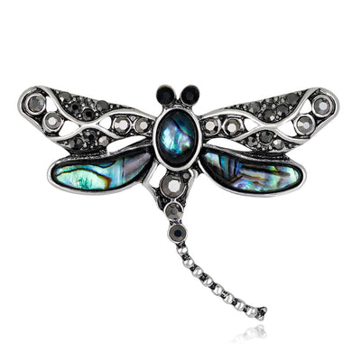 Front product view of the dragonfly brooch pin in silver and black