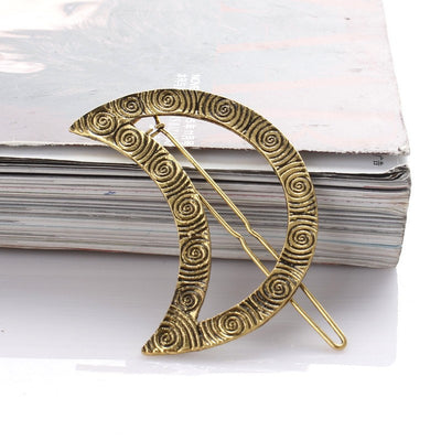 Primary supplied view of crescent moon statement hair clips
