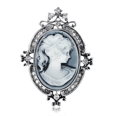 Front product view of the woman portrait brooch pin in silver and blue