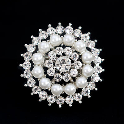 Front product view of the sunflower brooch pin in black and silver